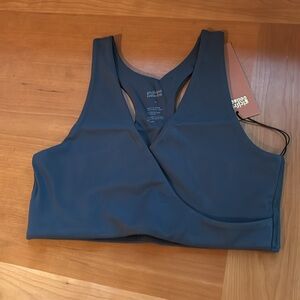 The Girlfriend Collective criss cross from green sports bra new